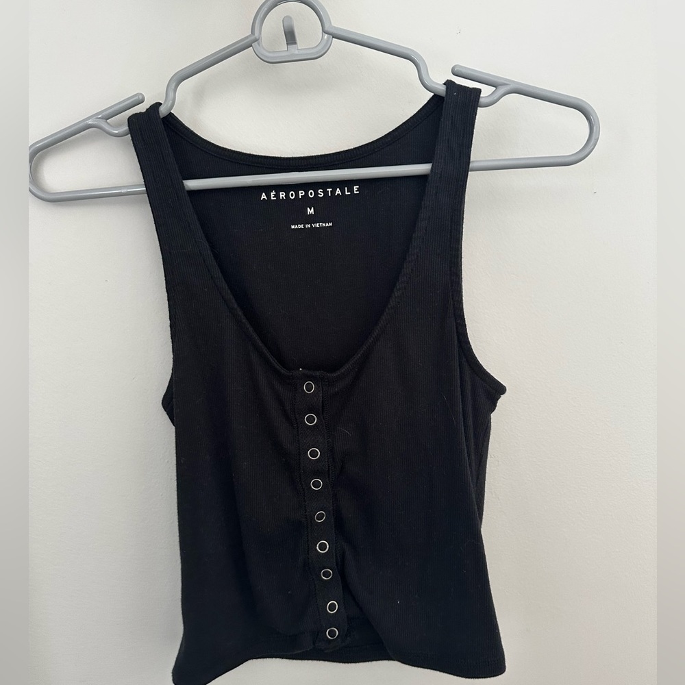 4 tank tops all size small but if your a medium this will be good too.